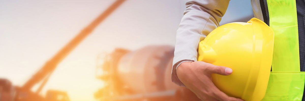 Worker holding a hard hat