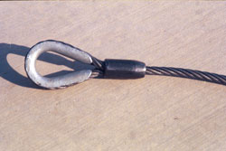 Figure 8. This wire rope has a thimble secured by an eyesplice, as required on the load end of suspension ropes.