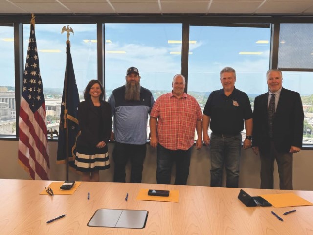  (Left to Right)  	Left standing - Karena Lorek, AD KCAO 	Jason Mendenhall, President and Business Manager, Local 663 (MO) 	Jeffrey Philgreen-Business Manager, Local 1290 (KS) 	Right standing - Todd Underwood- Area Director- Wichita Area Office