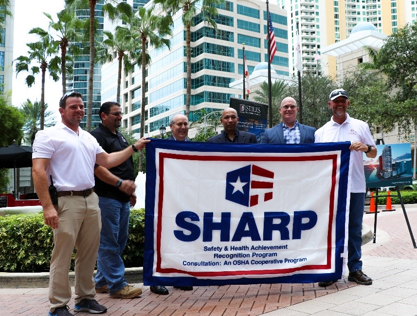 Stiles Construction Safety Committee on Residence of Las Olas Project - Left to Right: Brian Landon, Stiles Construction, Safety Mgr. Paul Ortolani, Stiles Construction, Safety Director Ian Schwartz, Stiles Construction, Vice president,  Condell Eastman, OSHA District Administrator Gabriel Garcia, USF Consultation Supervisor Joe Alvarez, Stiles Construction, Safety Mgr.