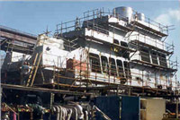 Figure 1: Staging around the super-structure of a ship to provide a work surface for maintenance. Access ladder is shown