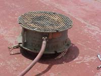 Figure 16: Corpus blower with proper guards and grounded with alligator clip ventilating fuel tank.