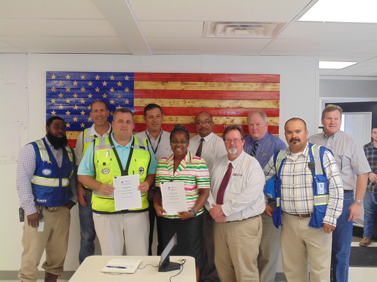 From Left to right: Mr. Rodney Cook (Holder Construction Group, LLC- Senior Safety Coordinator), Mr. Chris Paine (Holder-Senior Superintendent), Mr. Corey M. Lemming (Holder- Senior Project Manager), Mr. Jorge Cisneros (Holder- Corporate Safety Director), Mrs. Ramona Morris ( Birmingham OSHA Office Area Director), Mr. Hector Julian-Camacho (Birmingham OSHA Office Assistant Area Director), Mr. Matt Hollub (University of Alabama – SafeState, On-Site Consultation Program), Mr. Randy M. Easterling (University of Alabama – SafeState, Safety Program Supervisor), Mr. Marco Polo Chantres (Holder- Safety Director), Mr. John P. Redmond (Holder- Vice President).