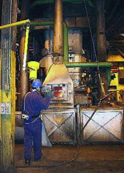 Fig. 1. Slag tap with enclosure hooding and local exhaust ventilation