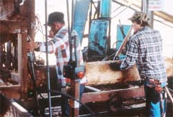 Preparing to put bolt through the saw.