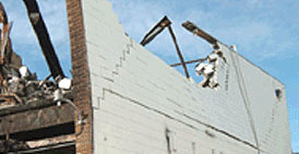 Photo courtesy of Cal/OSHA.  This picture shows actual disaster site work conditions and may not illustrate proper safety and health procedures.