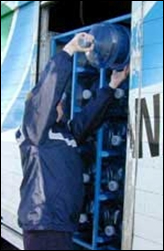 Reaching above the shoulder to load objects