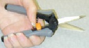 Fig. 2 Ergonomic snippers that spring back without operator force and minimize contact stress.
