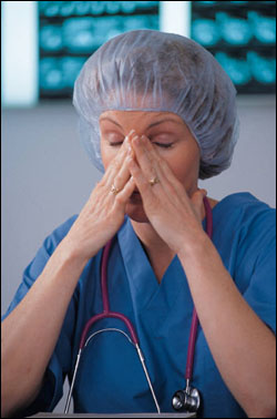 fatigued healthcare worker - Photo Credit: iStock