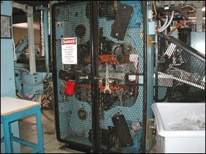 Figure 11. Fixed barrier guard in place preventing access to moving parts.