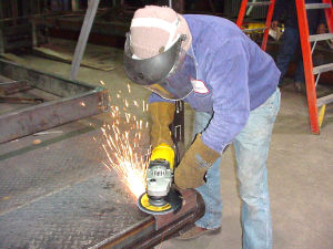 Figure 18. Hand grinding - Photo Credit: OSHA – from current eTool