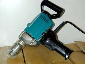 Handheld drill