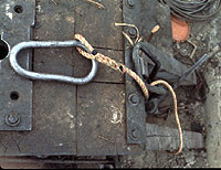 Figure 1: Spliced eye in natural fiber rope connecting an oval ring.