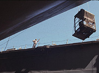 Figure 13: Hoisted workers are in continuous sight of signal person and keep their hands, arms, etc. within the basket while it is being moved