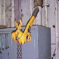 Figure 2: Upper hook of a come-along, secured in place by safety latch on hook