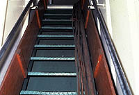 Figure 6: Ships stairs with hoses and lines neatly placed to one side