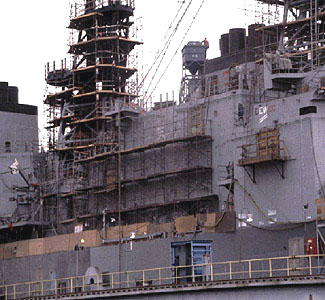 Figure 1: Scaffolding on side of ship to be used while working aloft