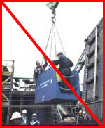 Figure 4: Improper practice - Workers in work basket suspended by a bridle with four legs; crane hook must have safety gate, or be moused
