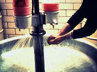 Figure 9: Worker using washing facilities