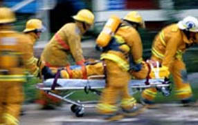 Emergency Reponse Workers - Firefighters with patient on stretcher - Photo Credit: iStock
