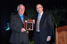 Then-Assistant Secretary of Labor Dr. Michaels, PhD, MPH., presenting SGE award to Charles Soderquist