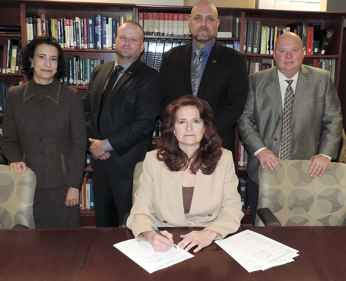 Seated: Kimberly Stille, Regional Administrator for OSHA Region VII; Standing (L to R): Dee Cantu, Acting Regional Administrator for OSHA Region VII; Dave Coleman, Business Manager for Local Union No. 10; Brian Garrett, President and Director of Training for the MO-KAN Ironworkers Apprenticeship Training Fund and Steve Rank, Executive Director of Safety and Health for the Ironworkers International.