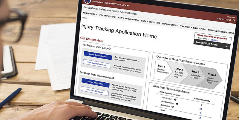 Worker at a computer viewing the OSHA web site