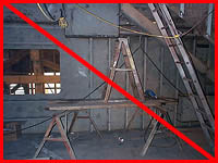 Figure 5: Improper practice - Horse staging with 2 x 10 planking, showing improper use of step ladder on it