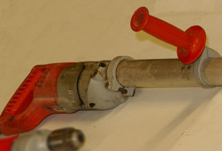 Figure 6 Drill with torque bar.