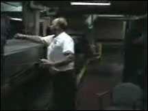 Figure 8. Extended reaching for a bag on the top belt