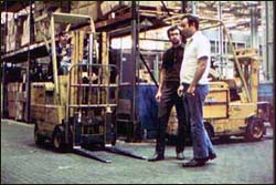 Figure 3. Slow down, stop and sound horn at intersections and wherever your vision is obstructed.