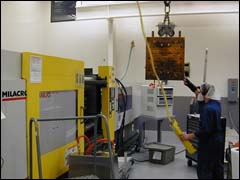Figure 6. An employee changes the mold of an injection molding machine. If exposed to potential injury from hazardous energy, follow the lockout/tagout procedure.
