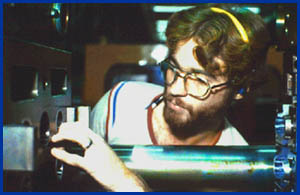 Worker using machinery