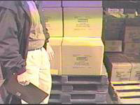 Figure 5: Empty pallets stacked to raise product to waist height.