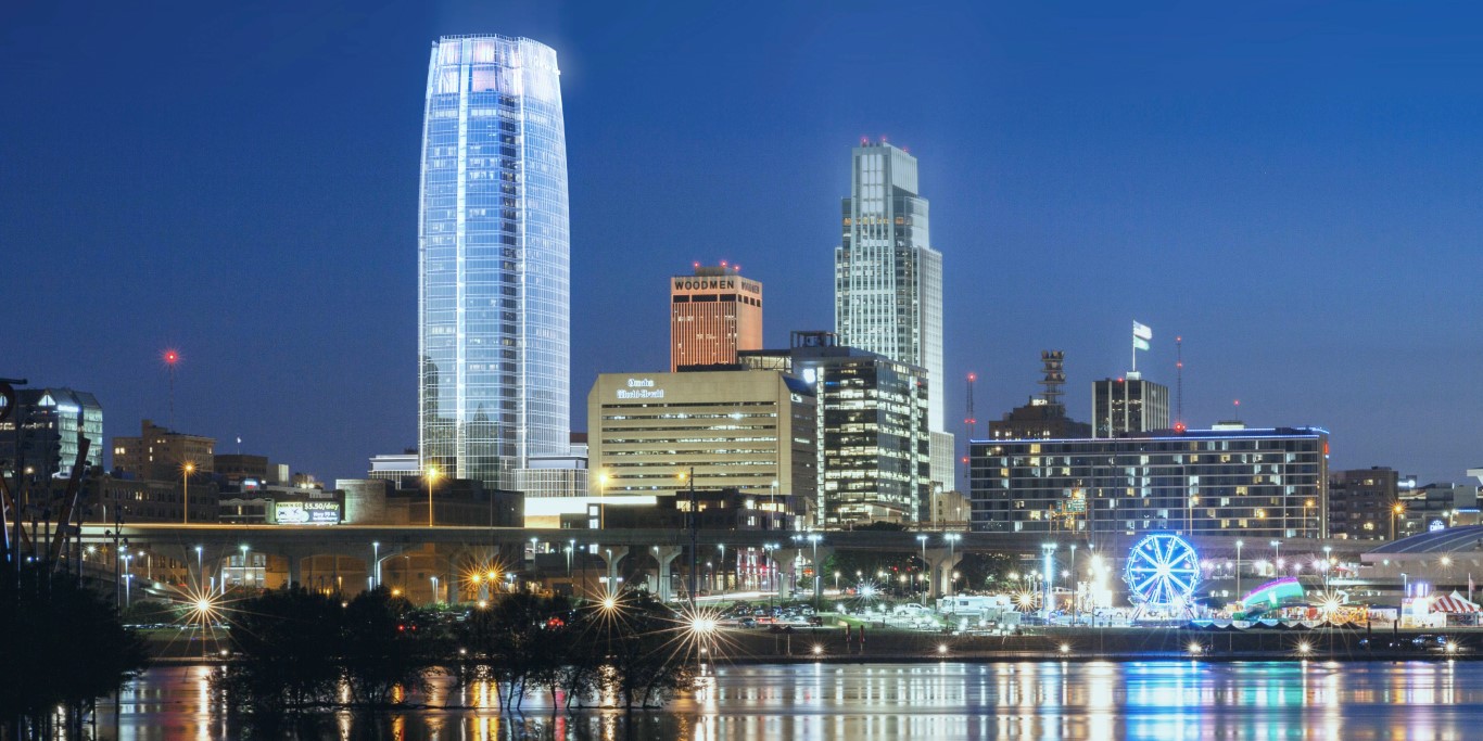 From a view across the Missouri River, a graphic artist design illustrating how the 44-story tower office building will appear during the nighttime with the Omaha, NE city skyline. This tower will become the tallest building in Nebraska.