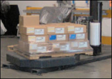 Figure 47. A semi-automatic pallet wrapper which can run independently of an operator once it has been setup.