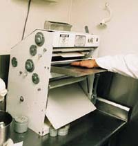 Pie crust maker with machine guarding