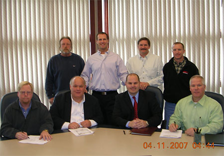Back row (right to left) Mark Buchanan, Ken Koroll (OSHA), Paul Bright, and Mike Kreutz Front row (right to left) Steve Williams, Bob Hoerr, Nick Walters (Peoria AD), and Dan Heinen