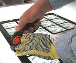 Figure 10. A retractable razor tool with an ergonomic handle will reduce stress on the hand.