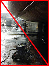 Figure 14: Improper practice - Wet and oily surfaces create slipping hazard