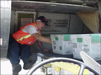 Figure 15. Avoid sitting on the edge of the cargo bin