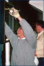 Figure 8. Employee reaching overhead.