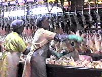 Image of workers at rehanging station