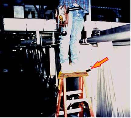Image showing operator standing on top step