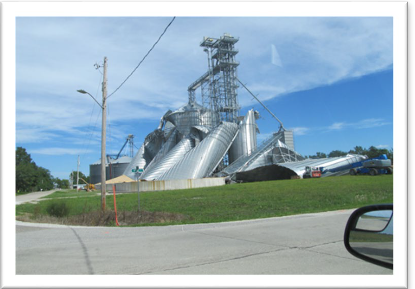 Grain bins twisted and destroyed from the storm