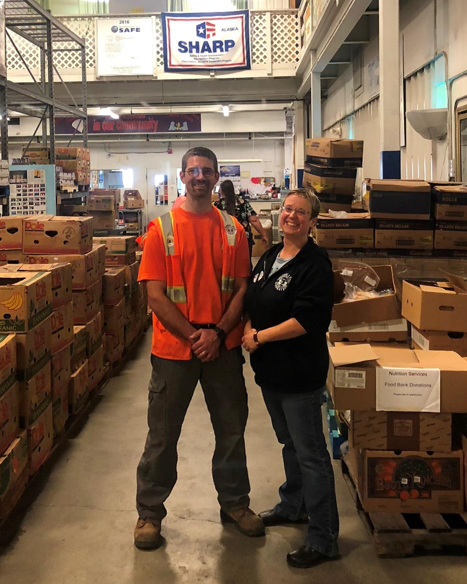 Philip Weaver and Anne Weaver in the food bank warehouse