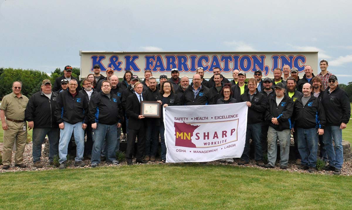 K&K Fabrication Team with SHARP Certificate and Flag