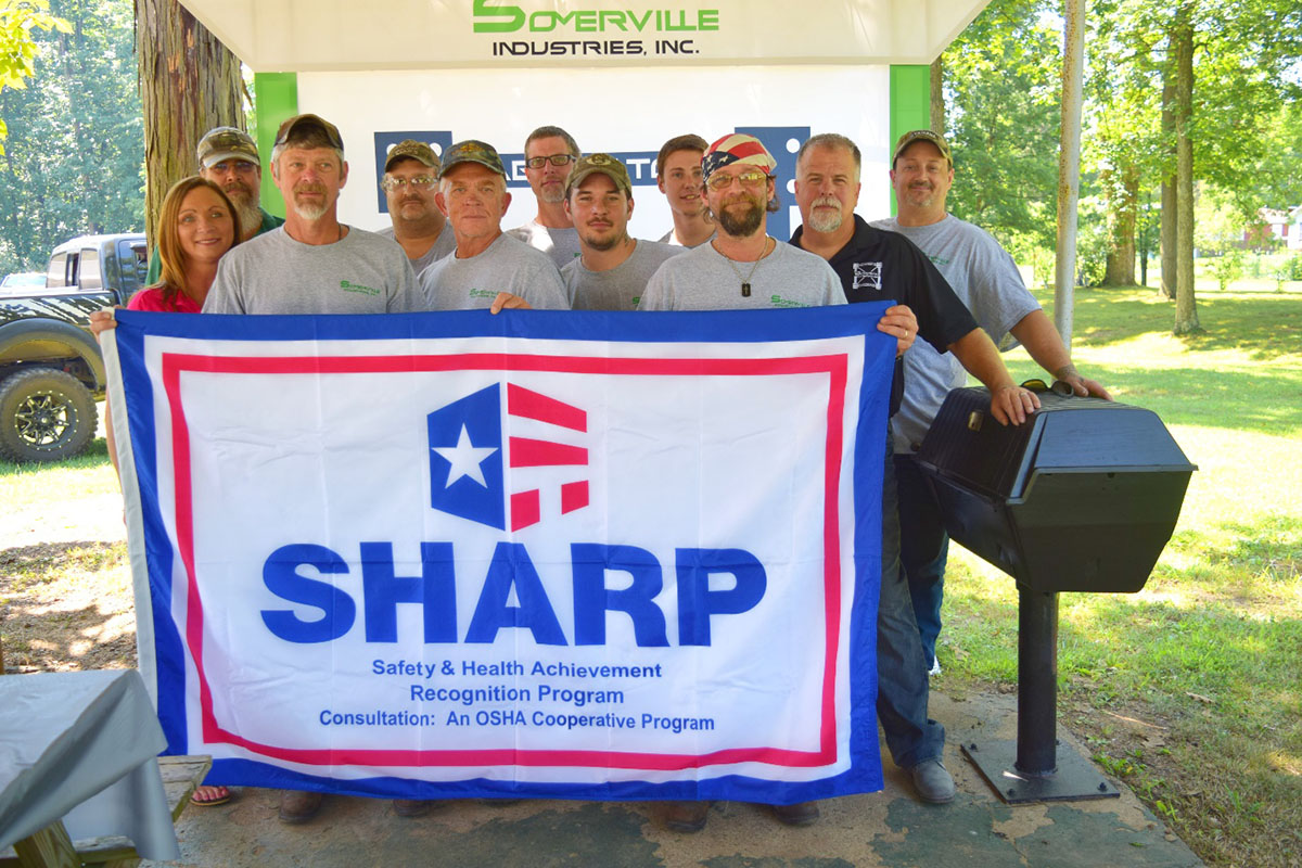 Left to right, Front Row: Mike Waldron, Rodger Smith, Jason Drake. Second Row: Peggy Somerville, Kyle Wood, Steve Somerville. Third Row: Nathan Somerville, Dan Bell, Mark Smith, Josh Byers, Jimmie Cremeans