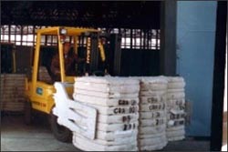 Figure 1. Carton clamp carrying cotton bales.