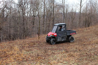 Driver travelling down a slope